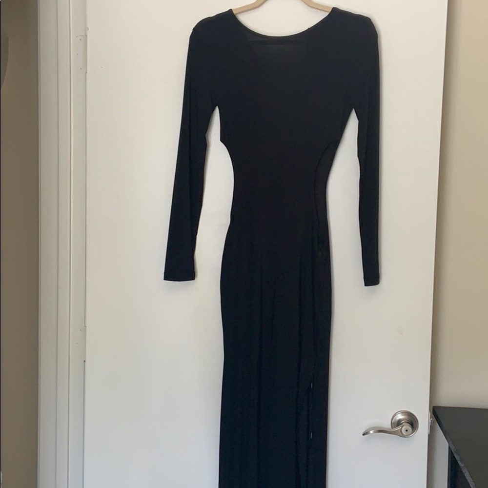 Black Maxi Dress with high slit and cutouts.